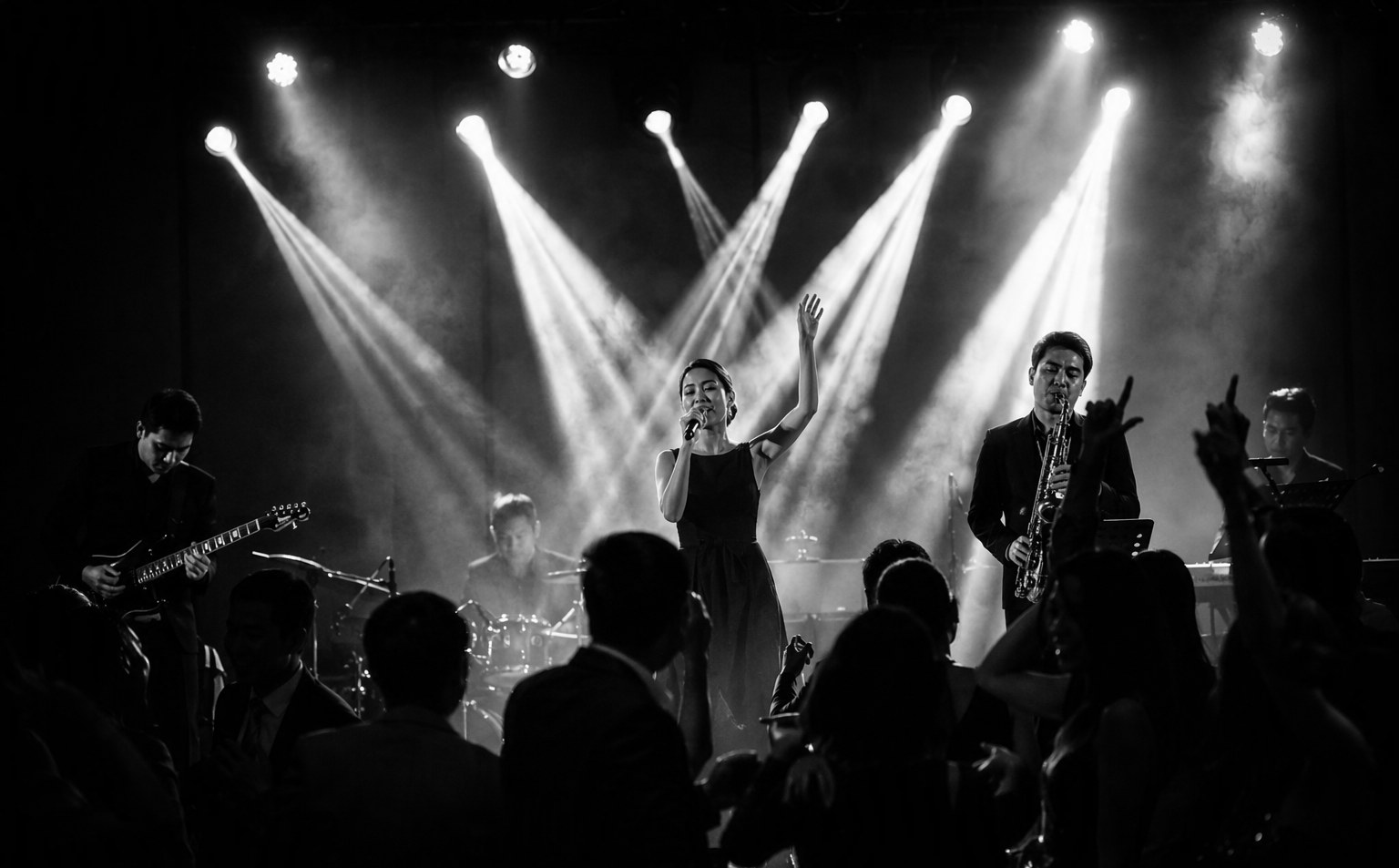 Live band performing on stage at a corporate dinner and dance event in Singapore